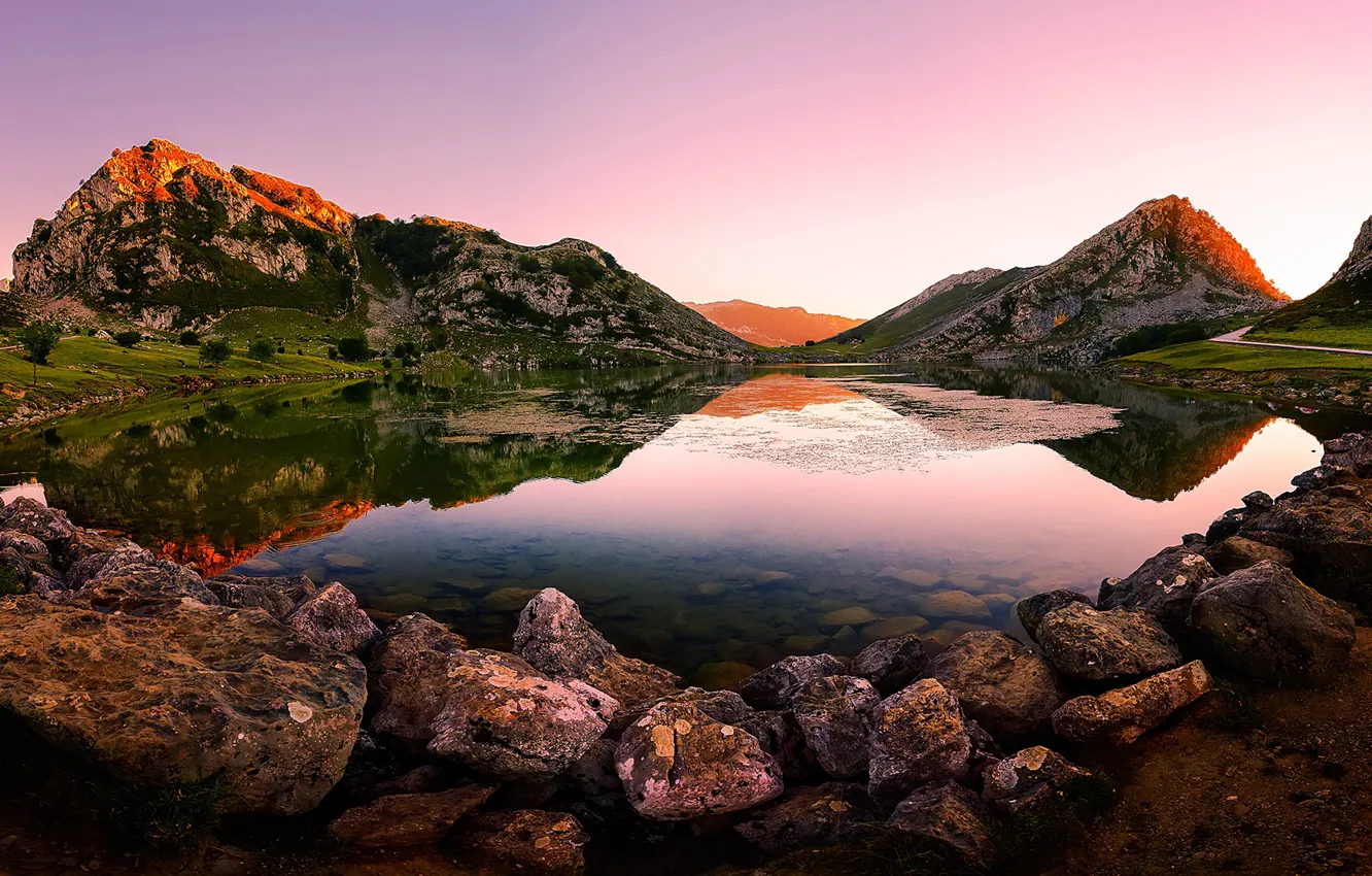 Photo wallpaper the sky, mountains, lake, stones, rocks, dawn, Spain, Asturias
