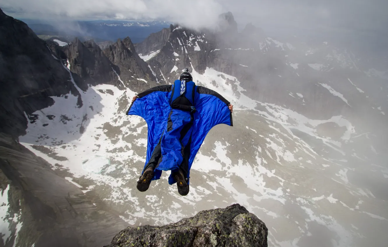Photo wallpaper clouds, mountains, rocks, parachute, container, pilot, extreme sports, wingsuit