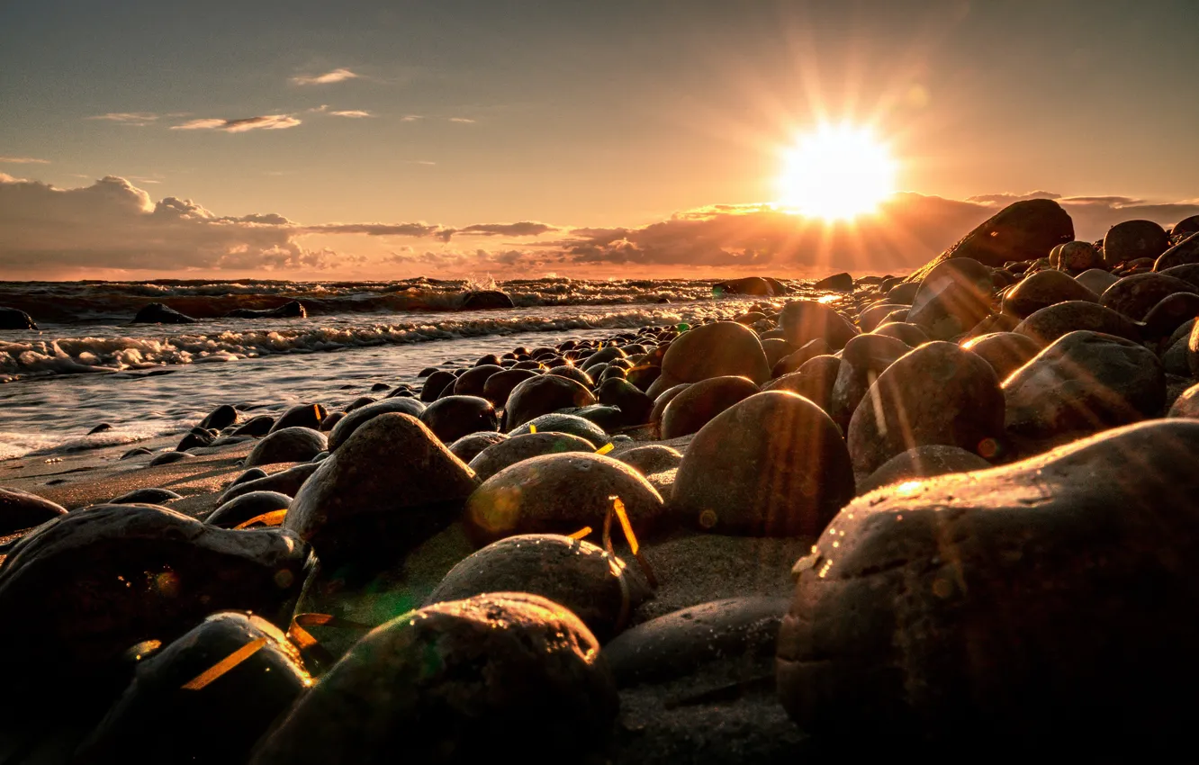 Photo wallpaper surf, shore, sea, the sun, stones, sunset