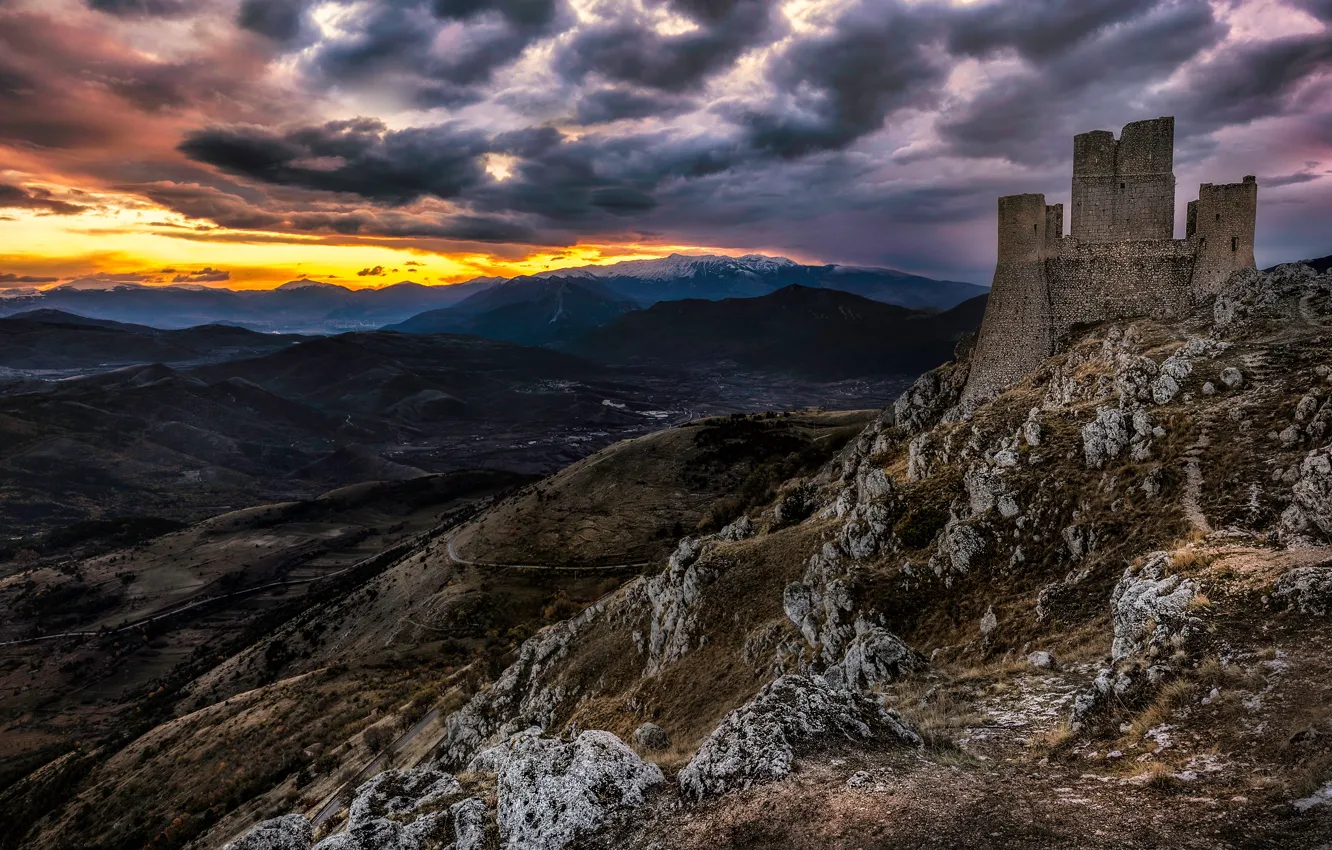 Photo wallpaper the sky, sunset, mountains, clouds, stones, castle, hills, height