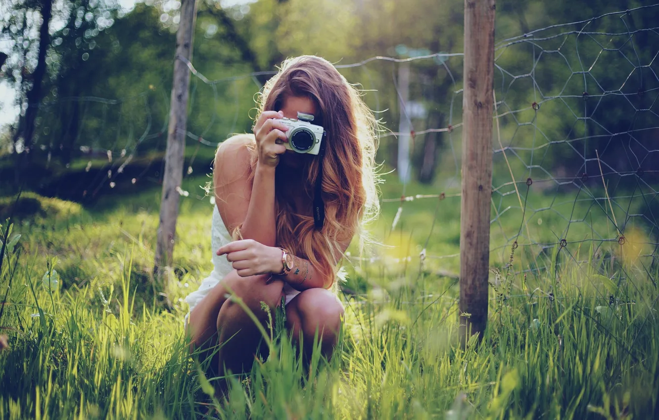 Photo wallpaper grass, girl, feet, hair, the fence, camera, dress