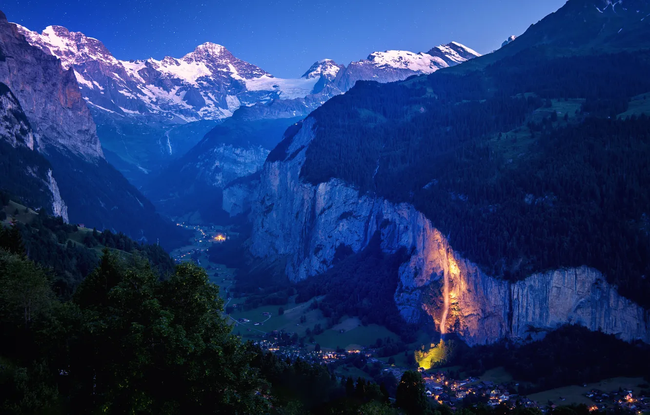 Photo wallpaper forest, snow, mountains, night, lights, rocks, tops, height