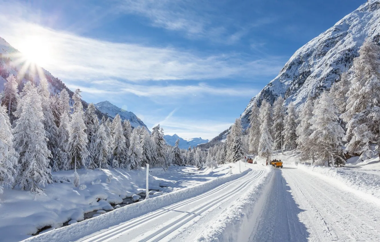Photo wallpaper winter, road, forest, the sky, the sun, clouds, snow, trees