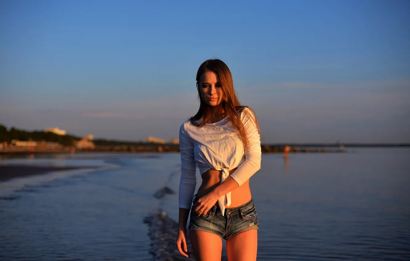 Photo wallpaper girl, beach, twilight, shorts, green eyes, long hair, legs, sea