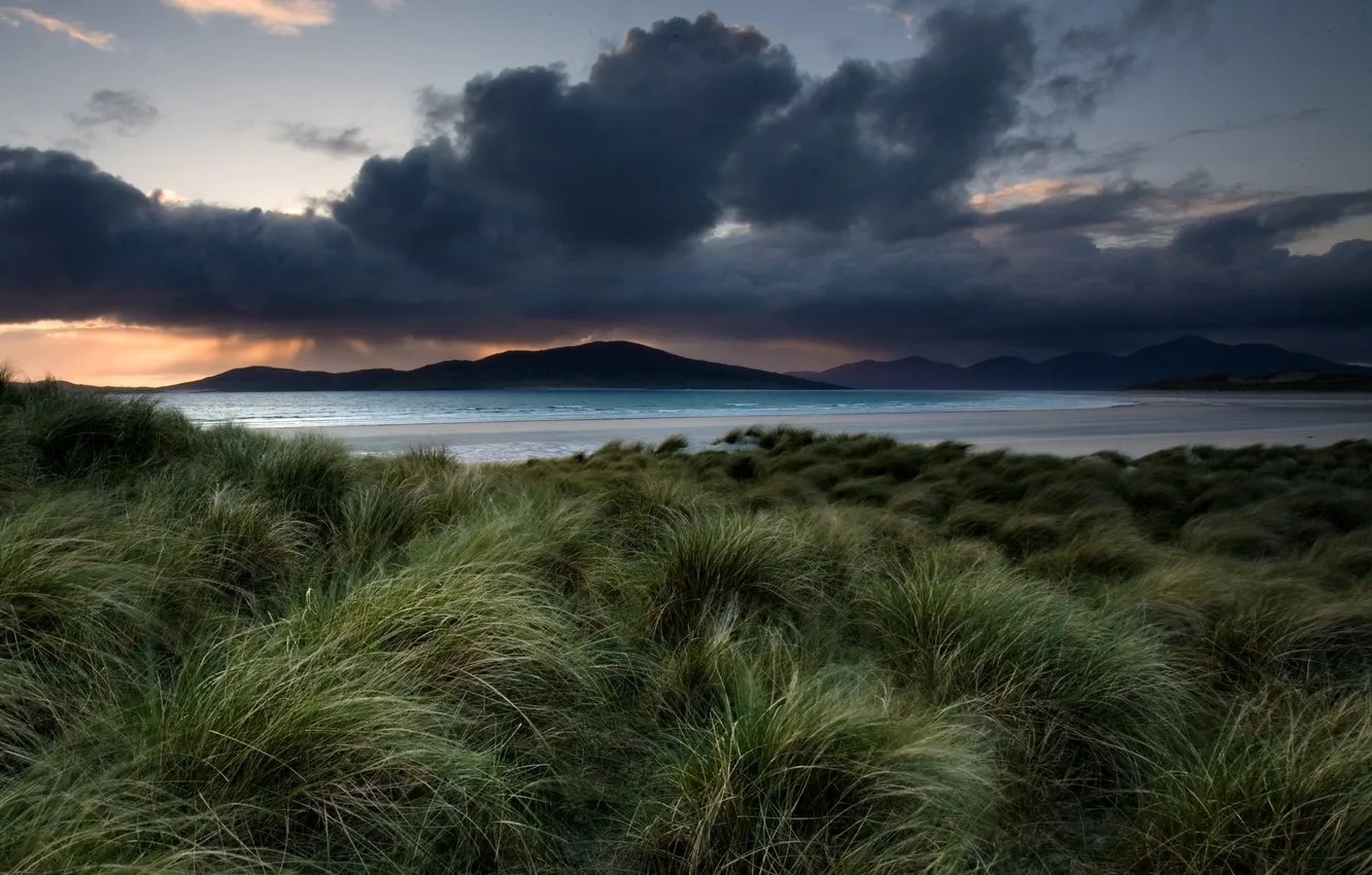 Photo wallpaper sea, grass, mountains, clouds, plant, the evening, Berg