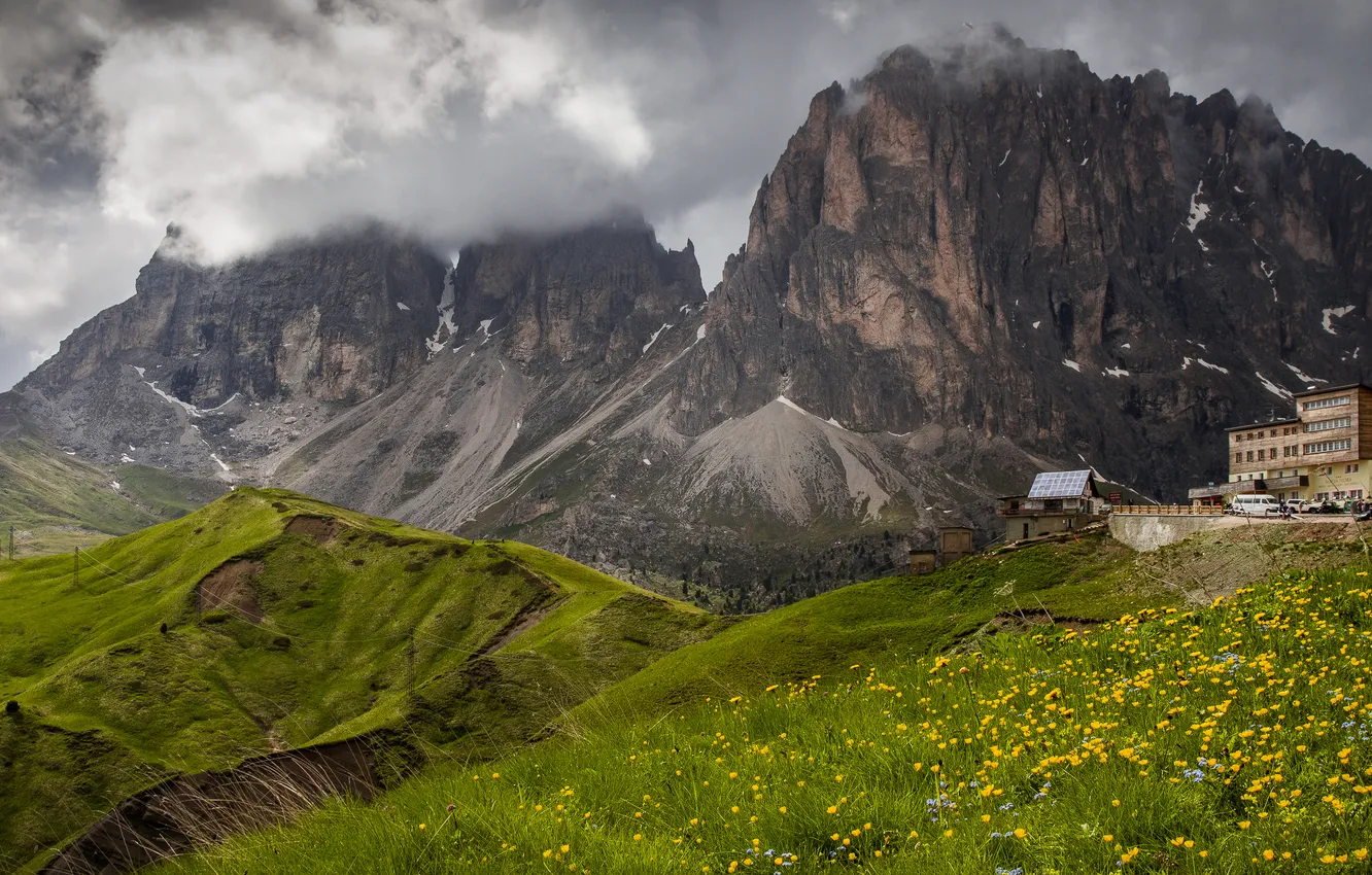Photo wallpaper field, clouds, flowers, mountains, rocks, tops, building, height