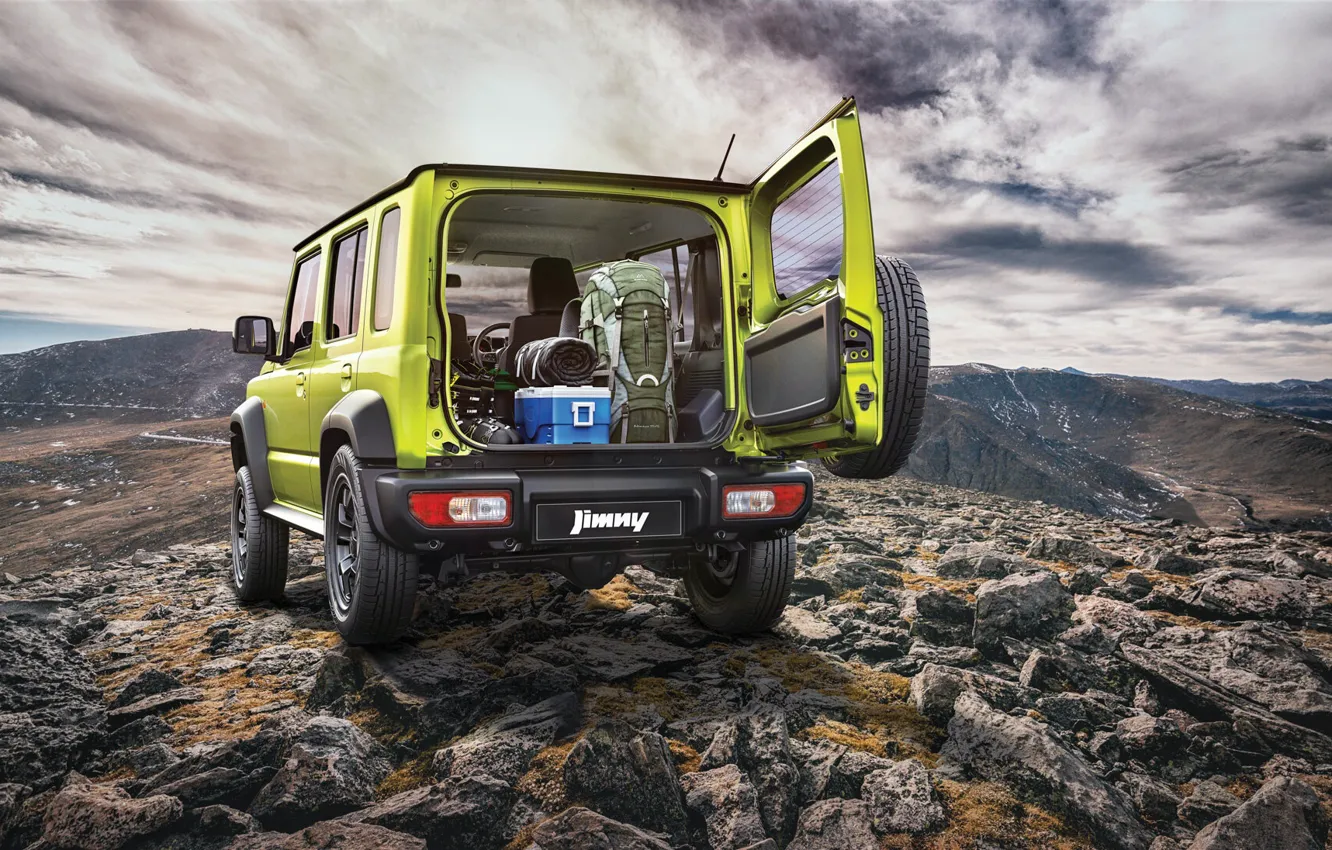 Photo wallpaper the sky, clouds, stones, space, Suzuki, rear view, Jimny, open door