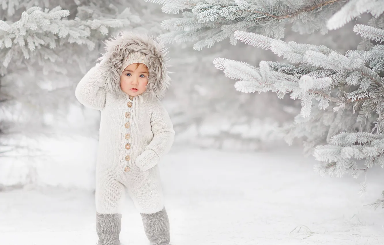 Photo wallpaper winter, snow, branches, boy, ate, hood, jumpsuit, child