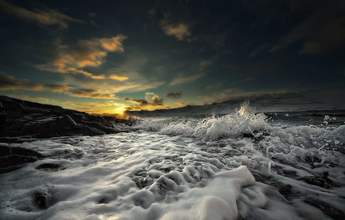 Photo wallpaper winter, wave, foam, water, the sun, snow, stones, horizon