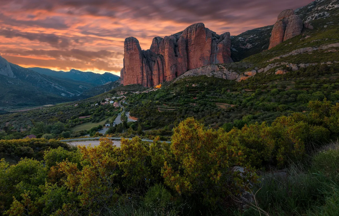 Photo wallpaper road, autumn, forest, clouds, trees, sunset, mountains, rocks