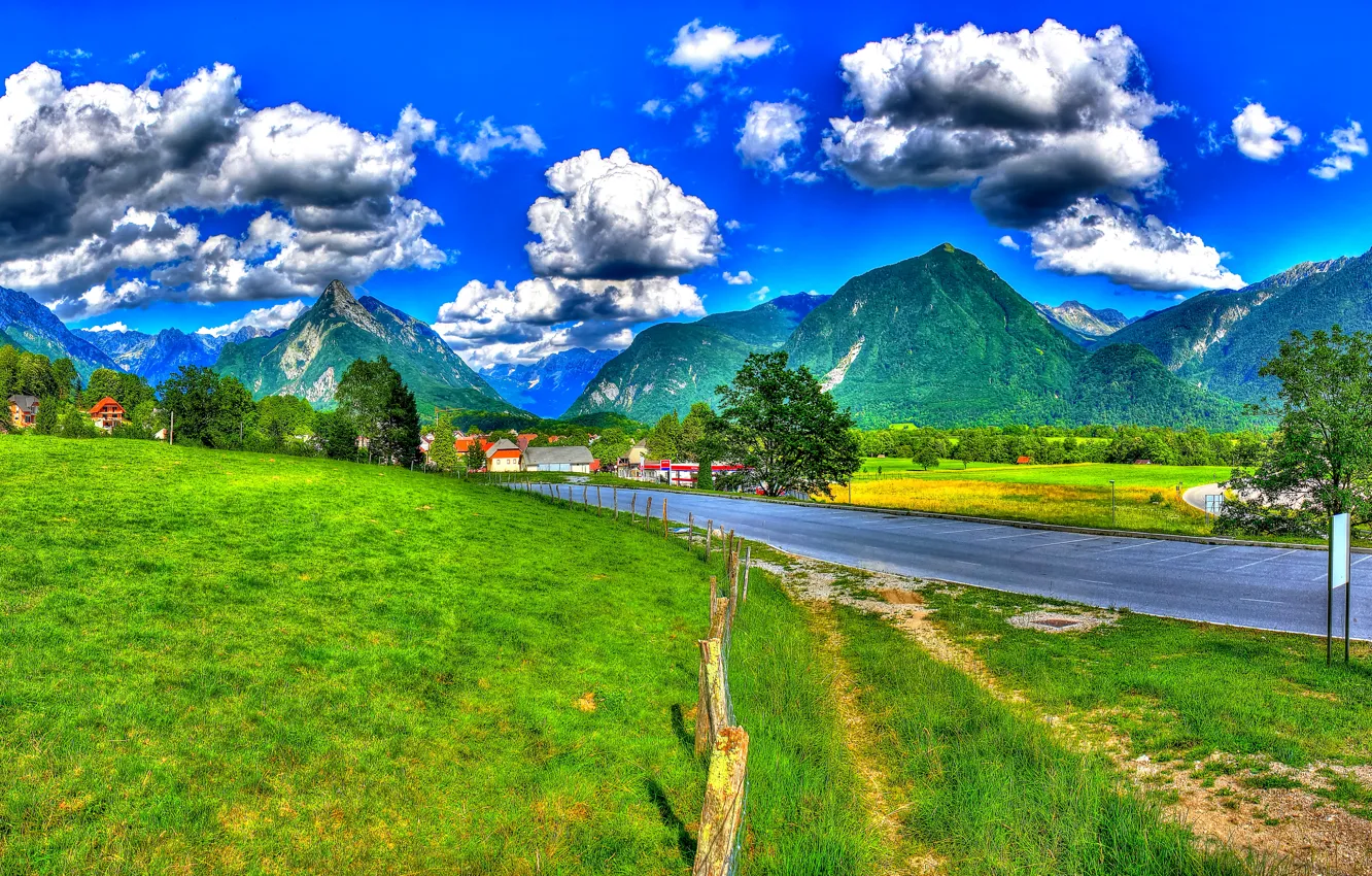 Photo wallpaper road, grass, clouds, trees, mountains, the fence, field, HDR