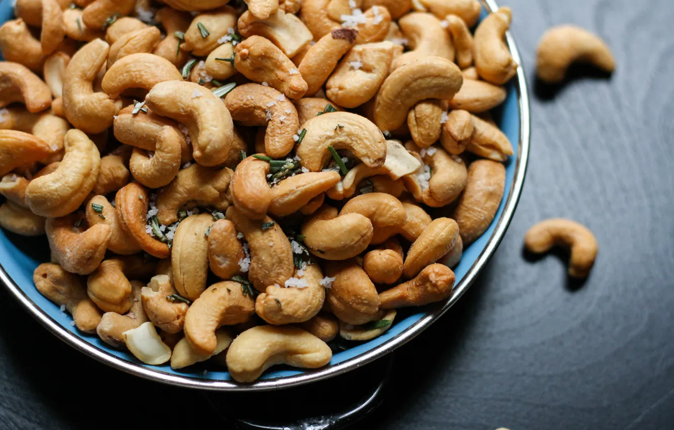 Photo wallpaper plate, nuts, nuts, spices, salt, cashews