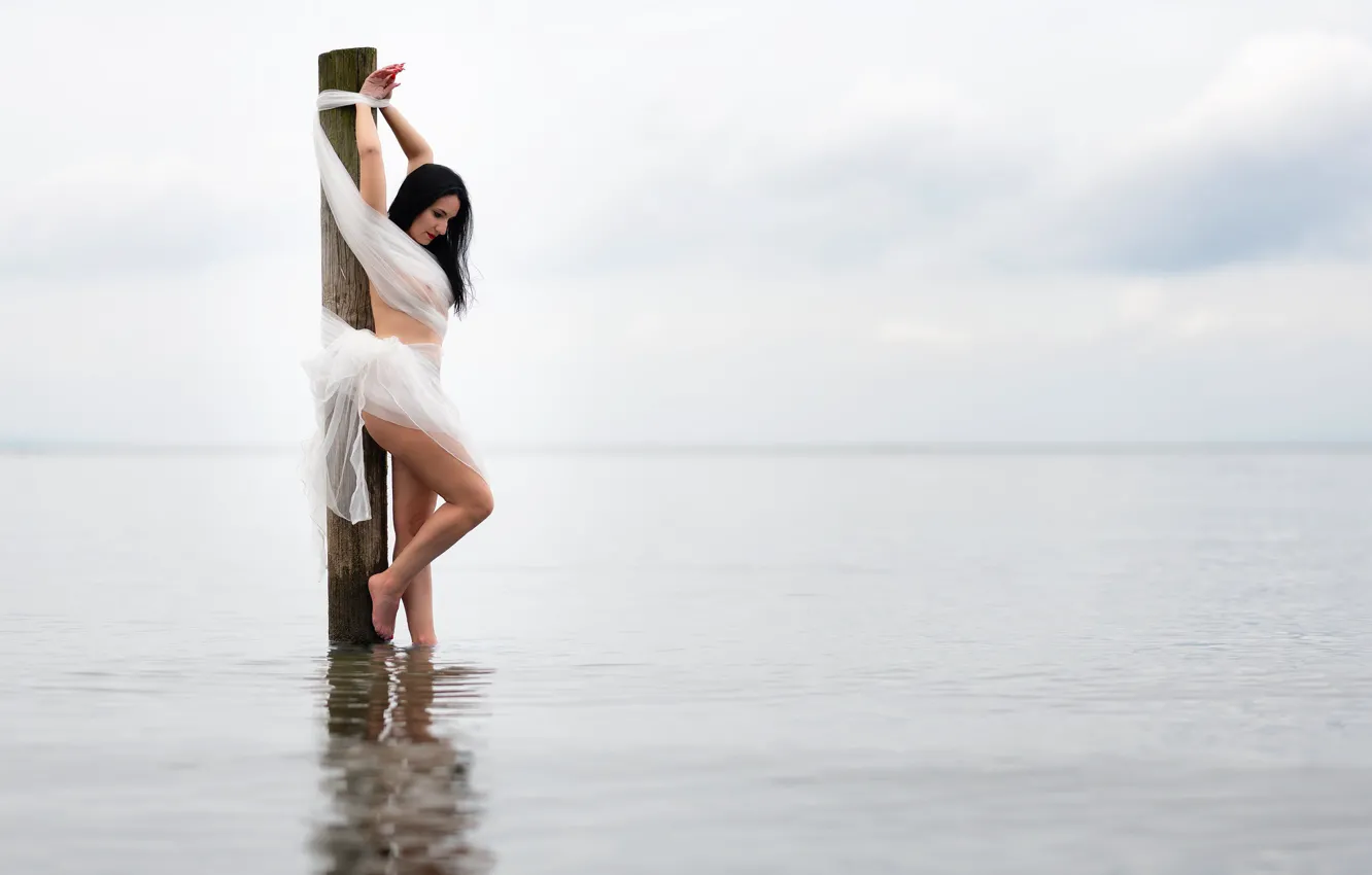 Photo wallpaper water, girl, lake, posts, the situation, brunette, pose. linked