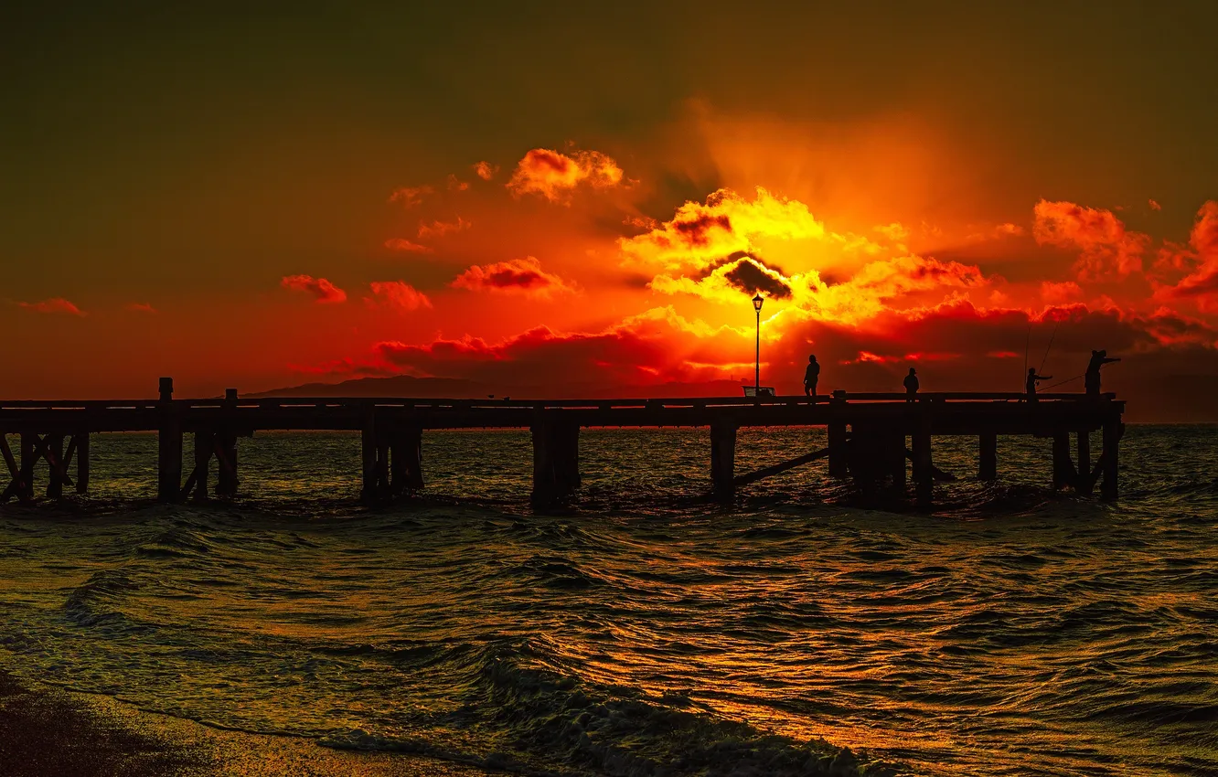 Photo wallpaper sea, the sky, clouds, sunset, people, silhouette, lights, pierce