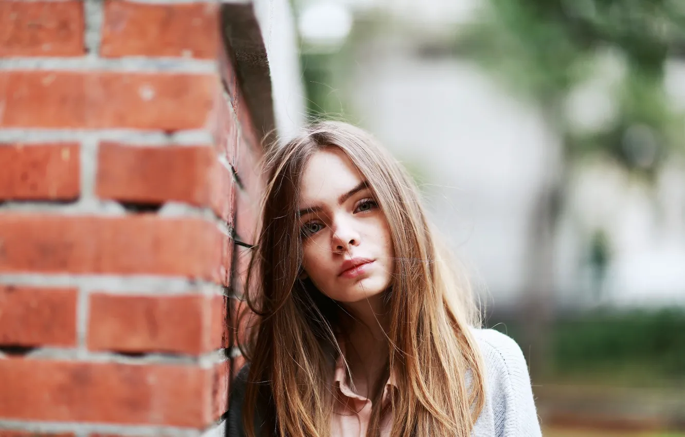 Photo wallpaper girl, wall, portrait, brick, makeup, hairstyle, brown hair, jacket