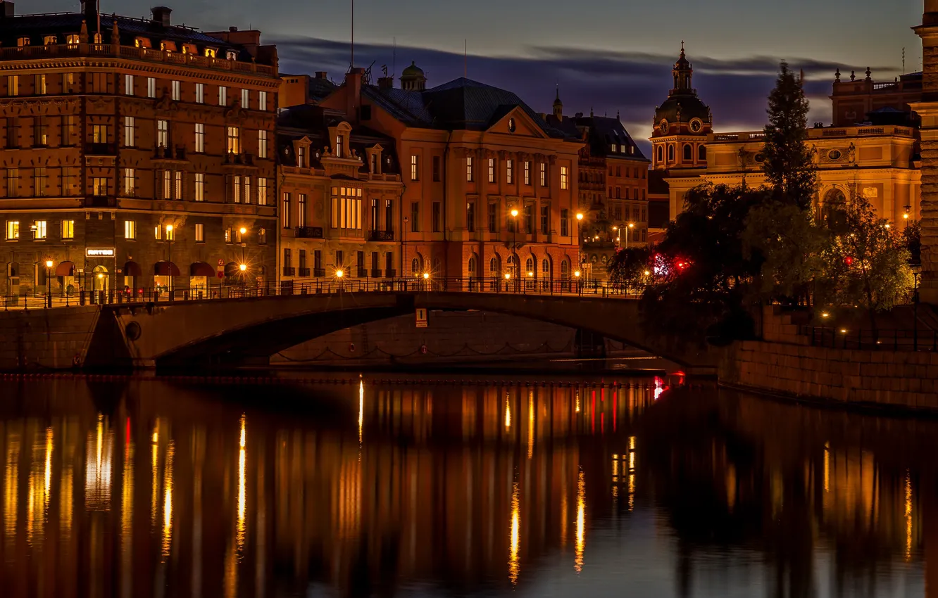 Photo wallpaper trees, night, bridge, lights, river, home, lights, channel