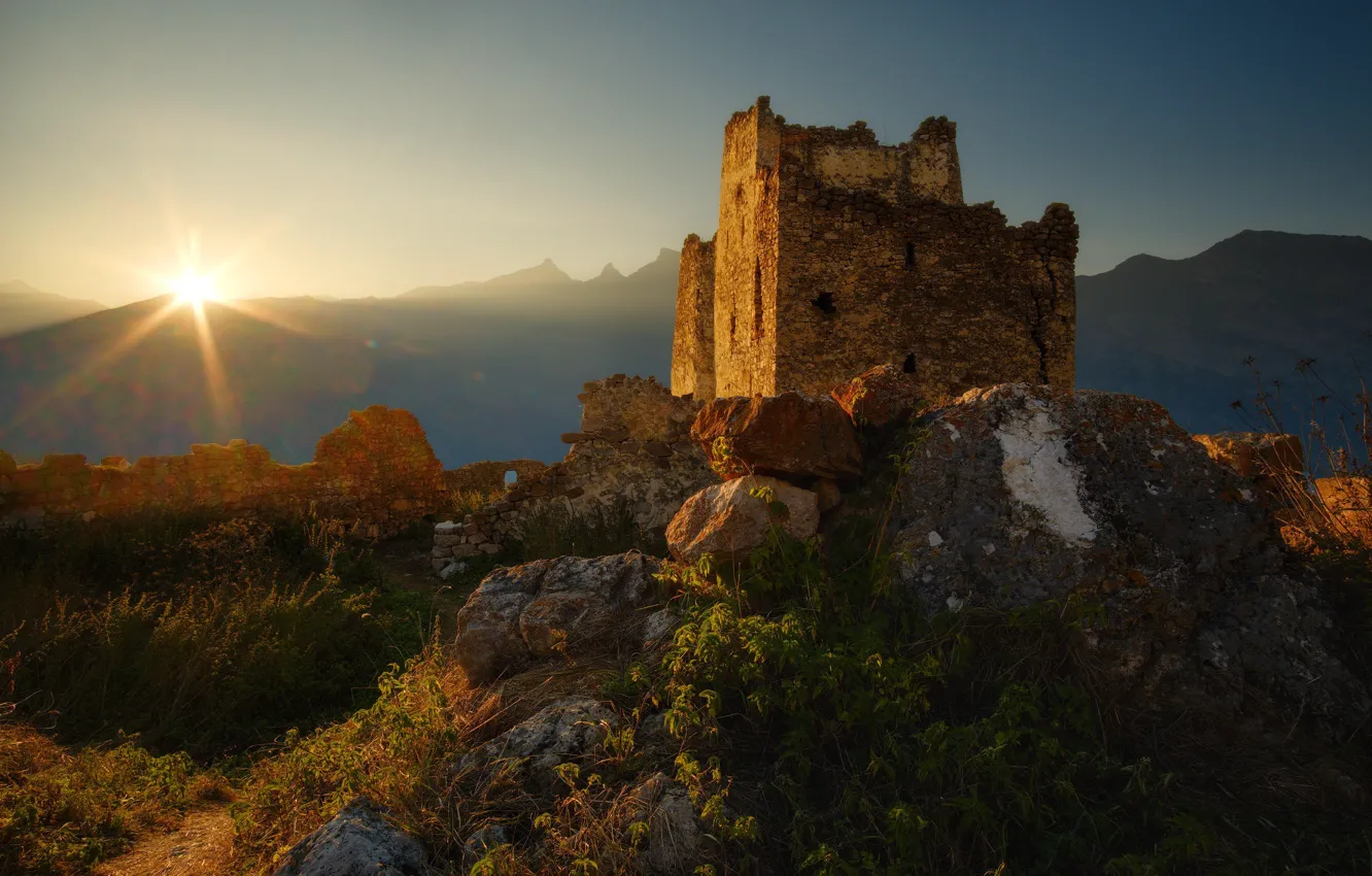 Photo wallpaper the sky, the sun, mountains, stones, tower, ruins, architecture