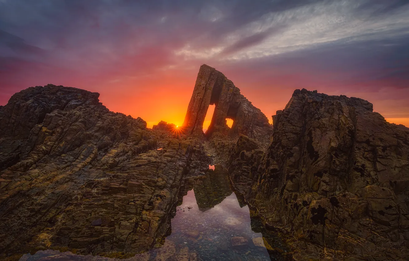 Photo wallpaper sea, the sky, the sun, clouds, sunset, reflection, stones, rocks
