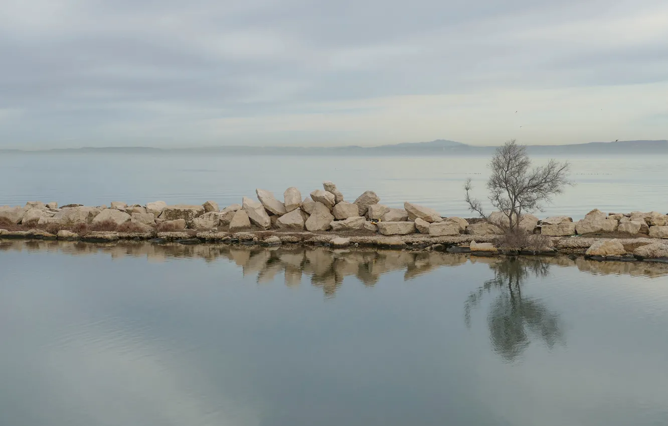 Photo wallpaper water, lake, stones, pierce