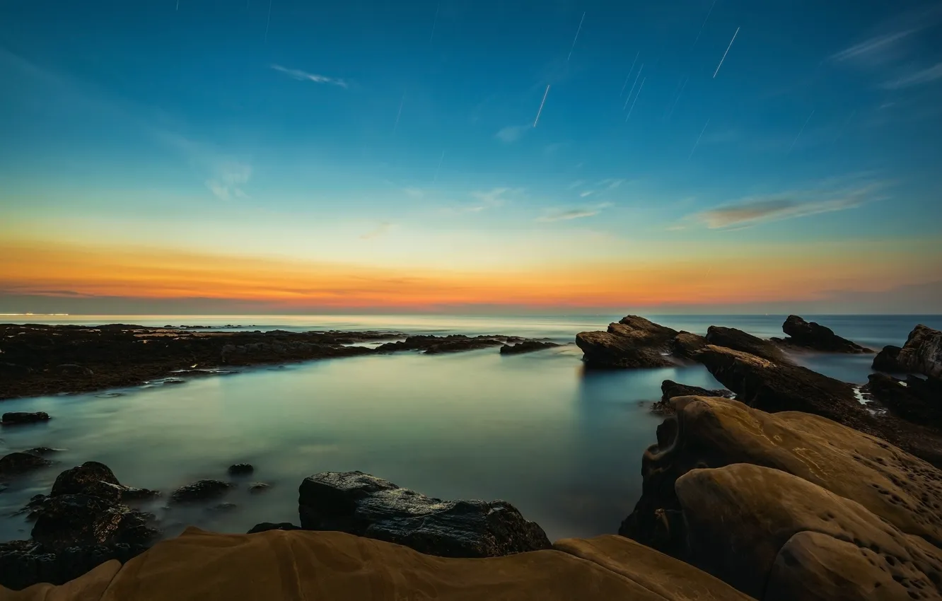 Photo wallpaper sea, the sky, sunset, blue, stones, rocks, blue, shore