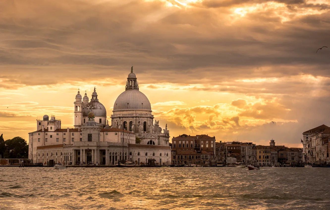 Photo wallpaper the sky, clouds, light, sunset, the city, shore, view, building