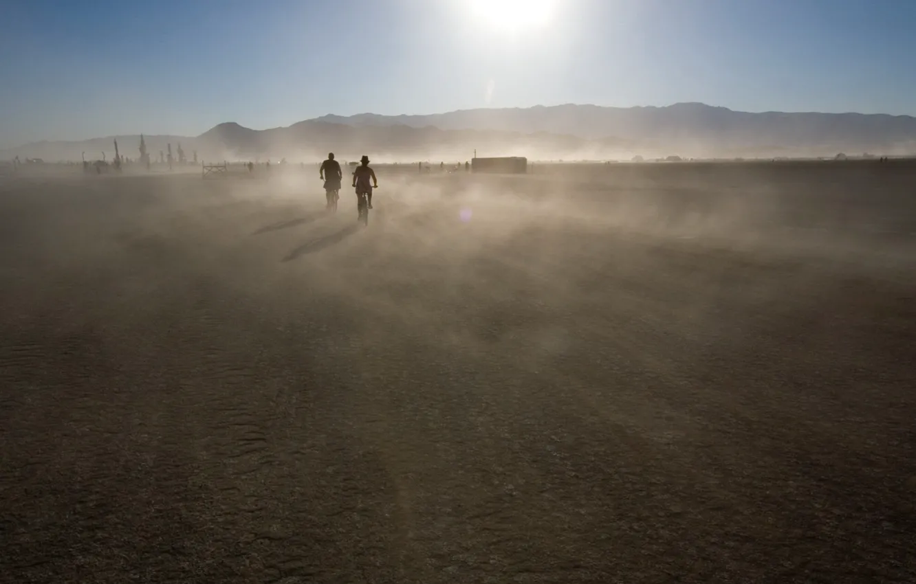 Photo wallpaper the sun, mountains, movement, dust