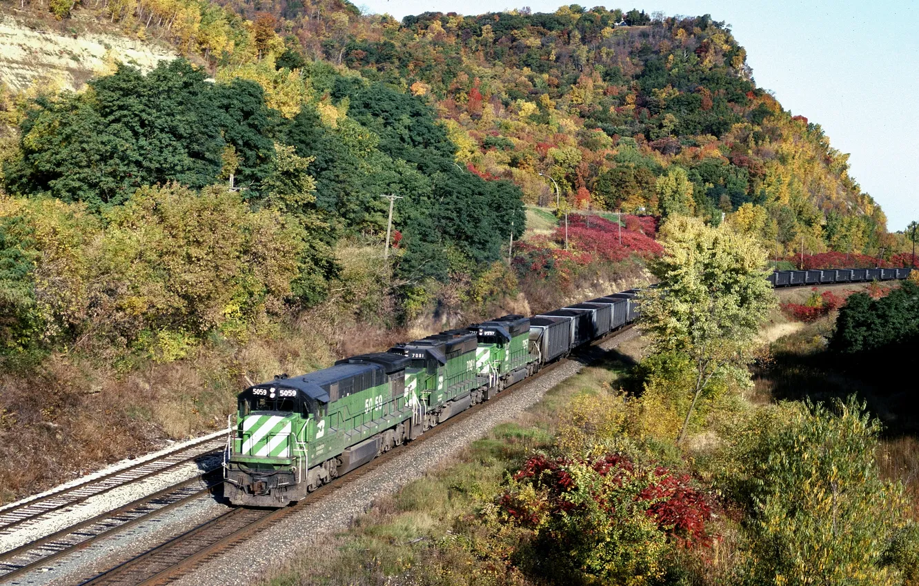 Photo wallpaper trees, mountains, the way, foliage, cars, railroad, mound, freight train