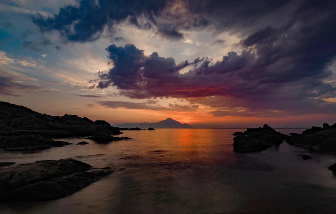 Photo wallpaper sunset, mountains, clouds, stones, shore, twilight, pond