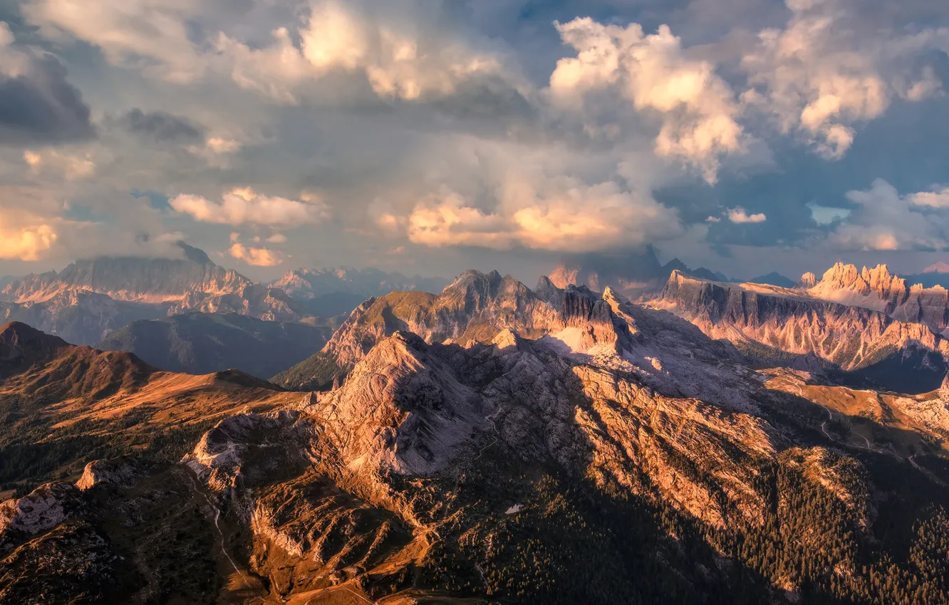 Photo wallpaper the sky, clouds, light, mountains, stones, rocks, tops, view