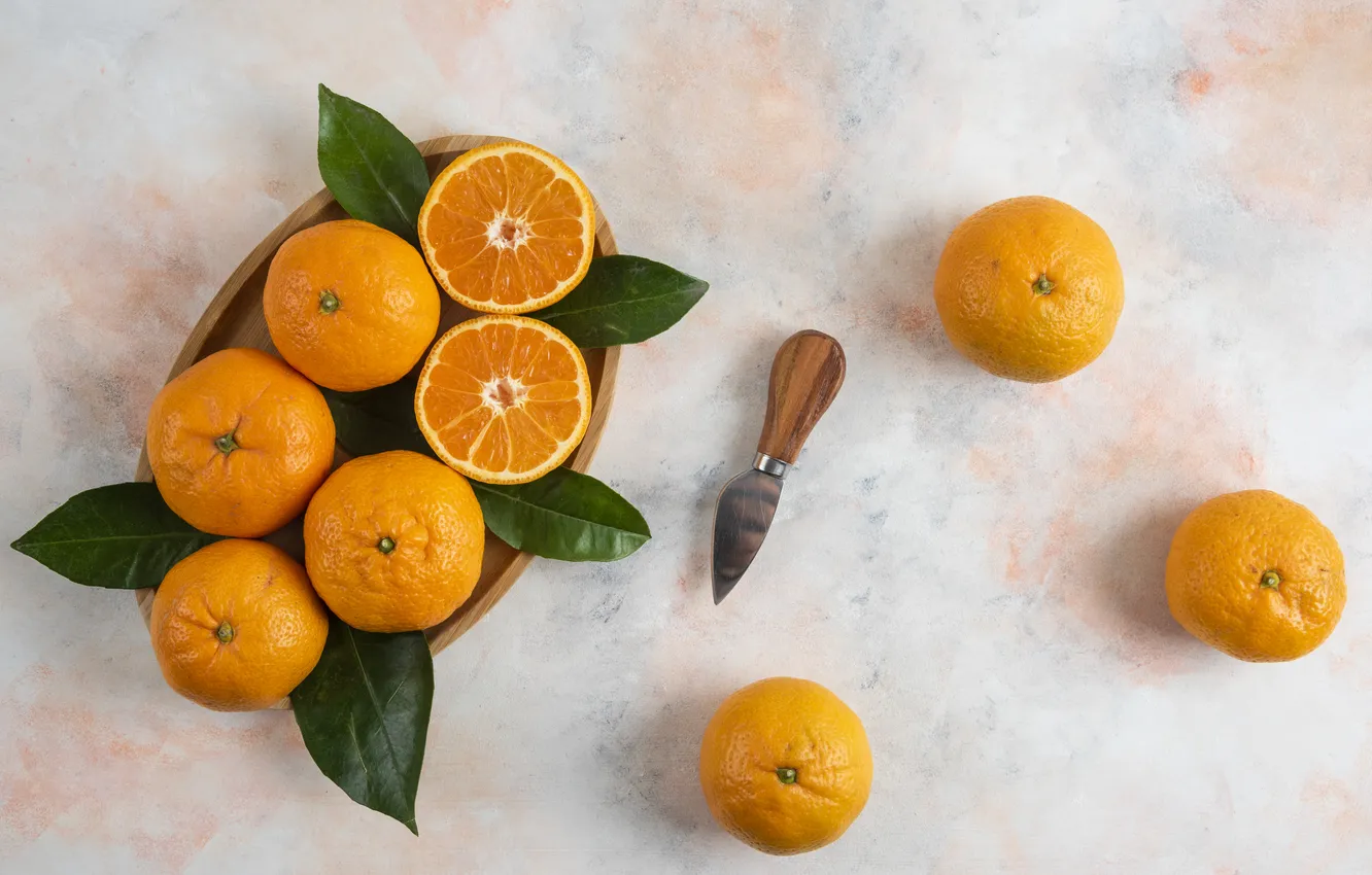 Photo wallpaper knife, tray, tangerines