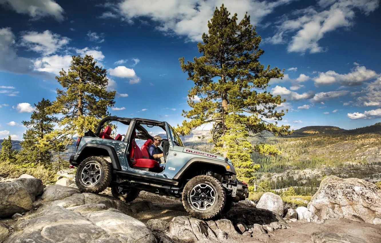 Photo wallpaper the sky, clouds, trees, mountains, stones, car, high, patency