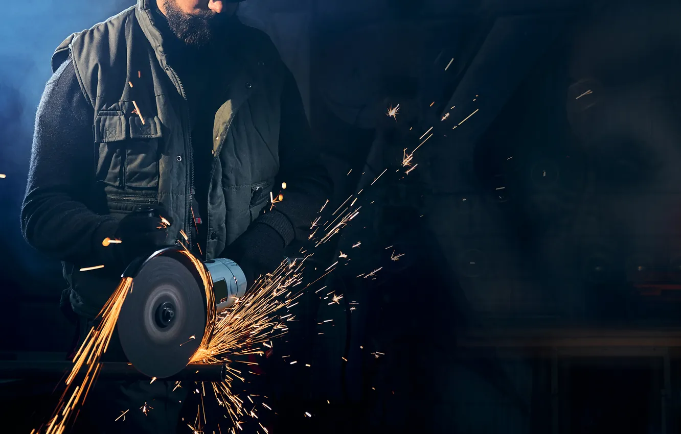 Photo wallpaper sparks, worker, meat grinder