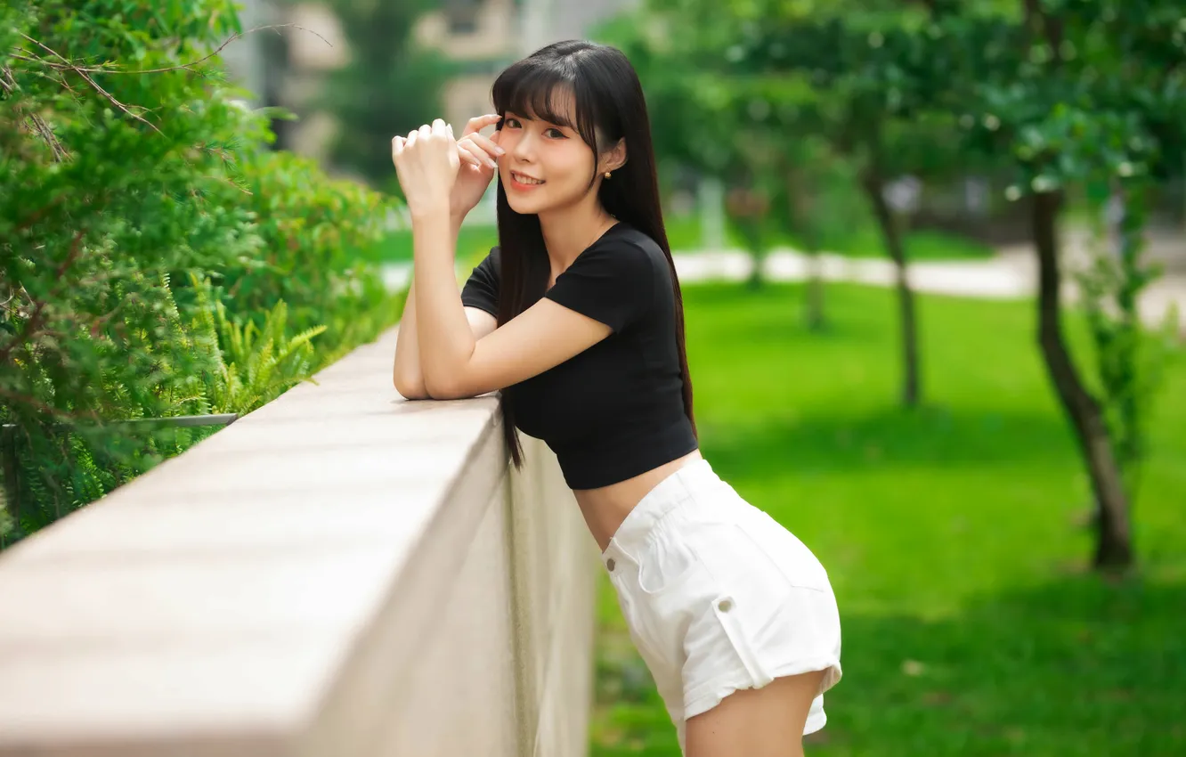 Photo wallpaper grass, look, the sun, trees, pose, model, shorts, portrait