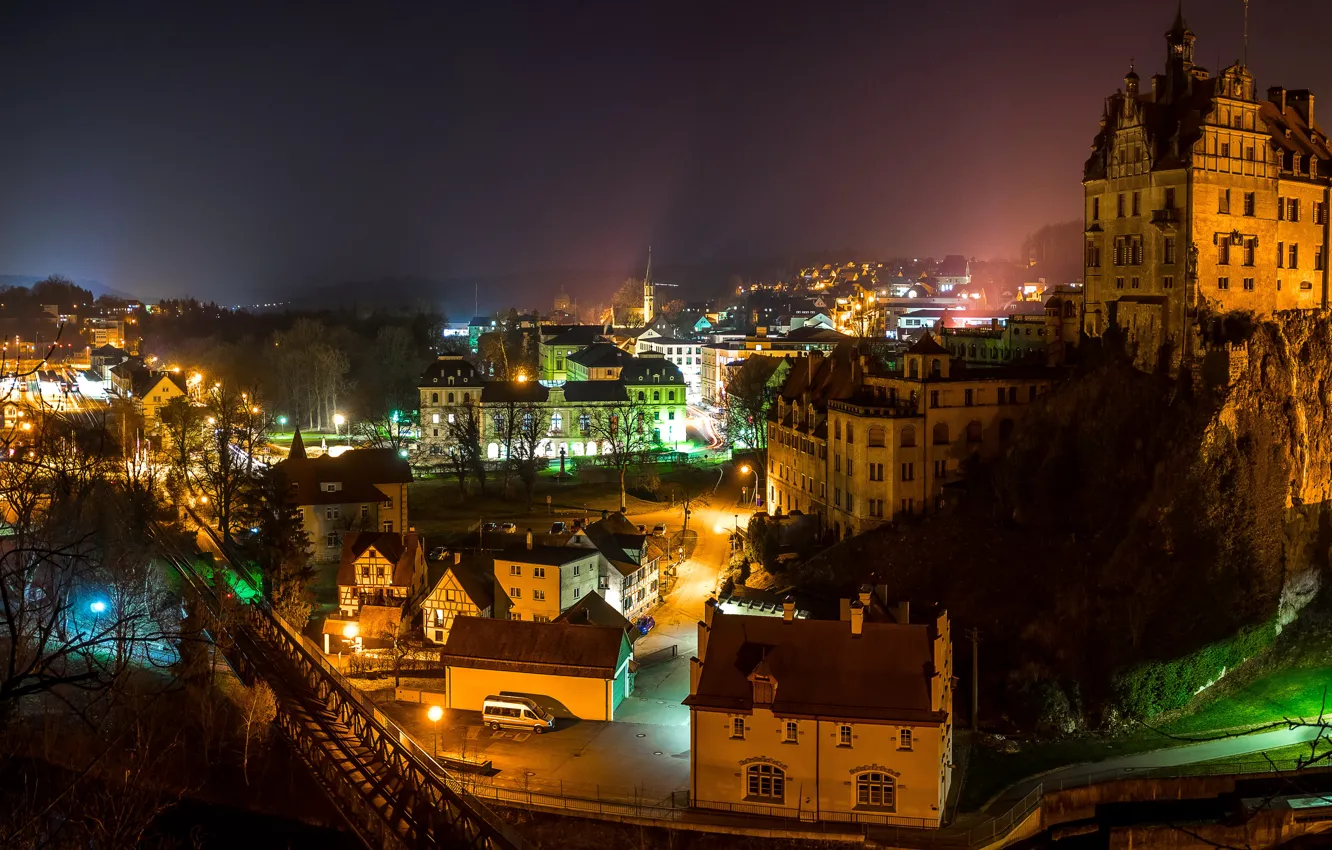 Photo wallpaper road, night, bridge, lights, fog, castle, rocks, home
