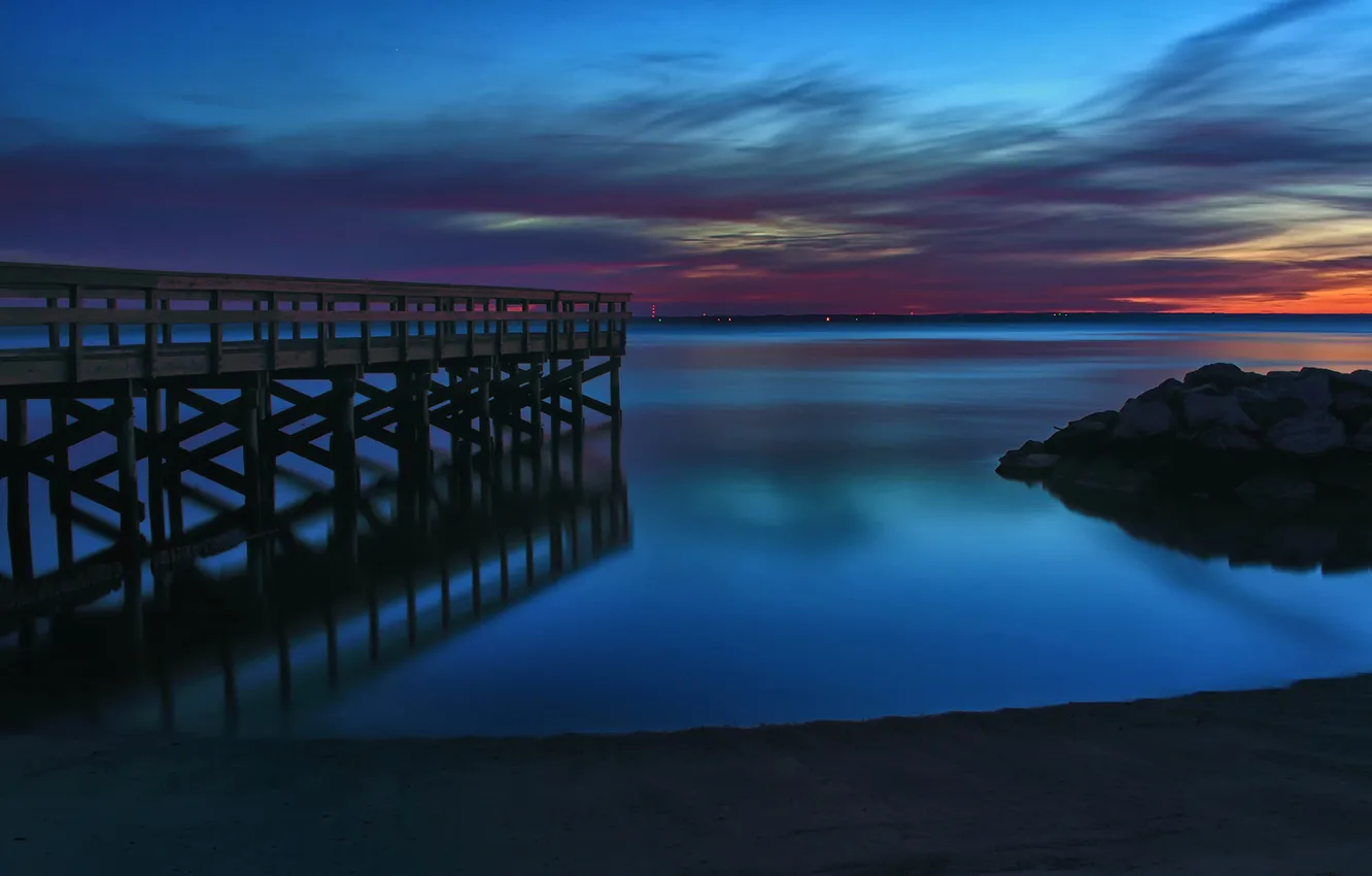 Photo wallpaper sea, the sky, clouds, sunset, rocks, pierce, glow, the bridge