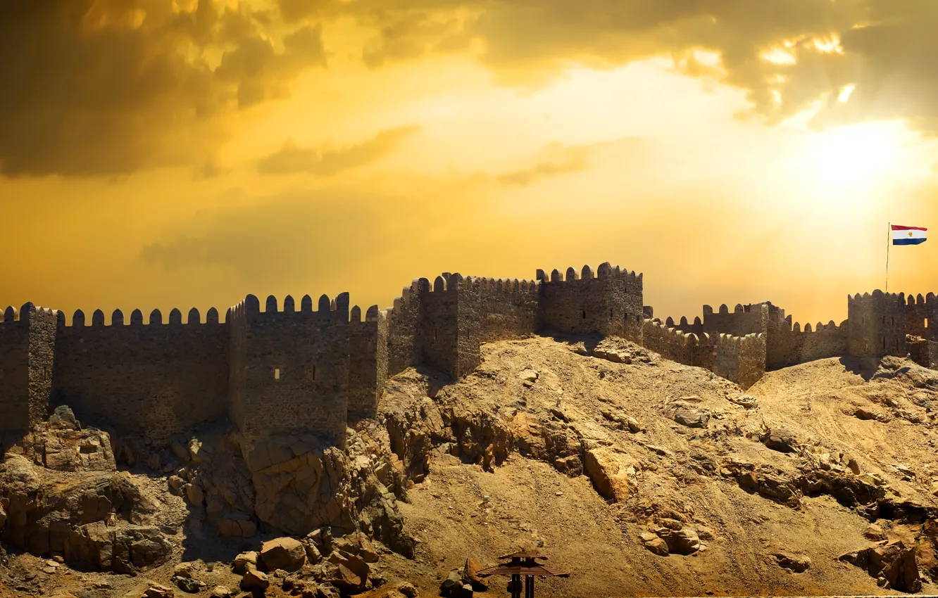 Photo wallpaper sand, the sky, the sun, rays, clouds, stones, wall, desert