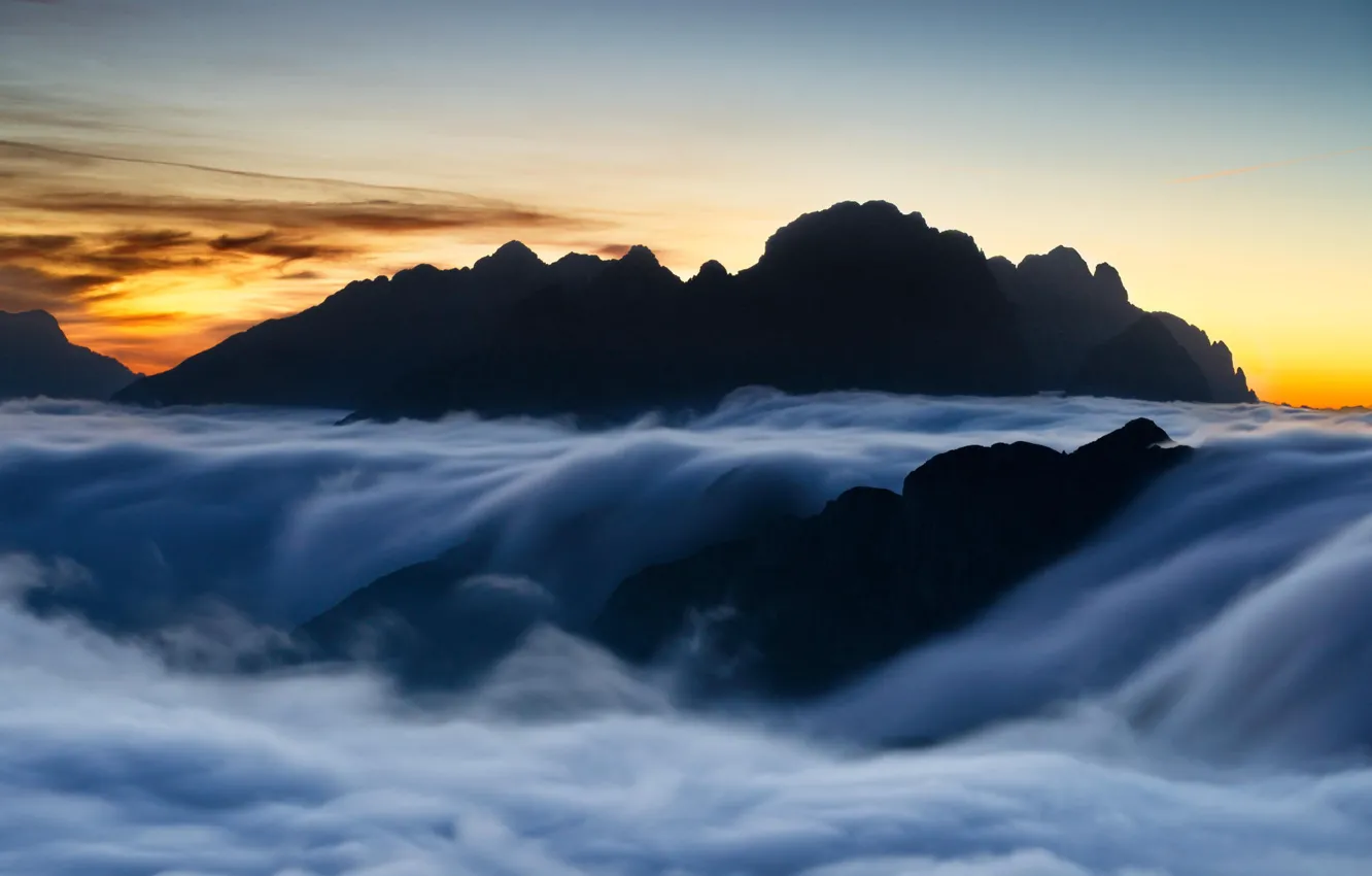 Photo wallpaper clouds, mountains, dawn, tops, silhouette