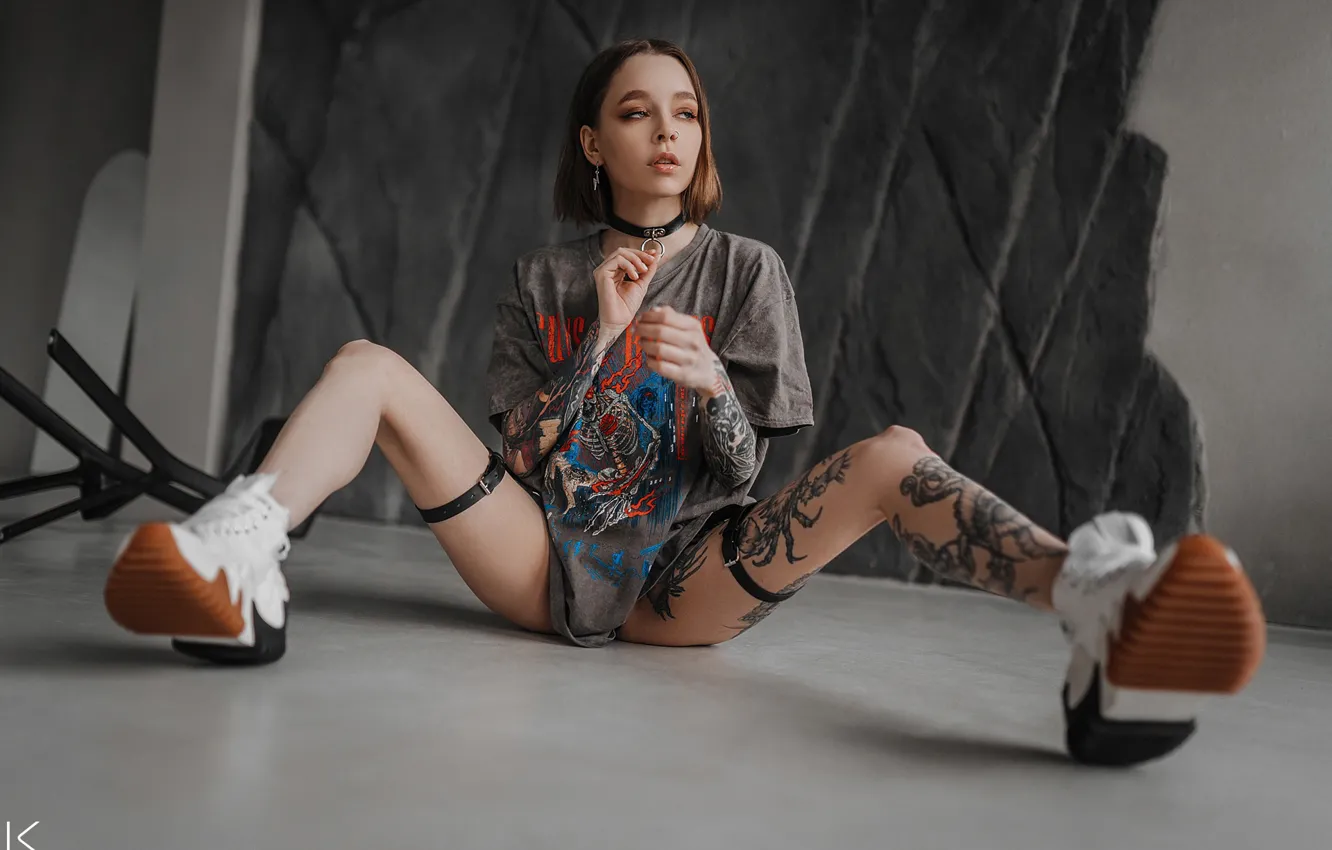 Photo wallpaper girl, pose, feet, tattoo, t-shirt, on the floor, sneakers, Sergey Freyer
