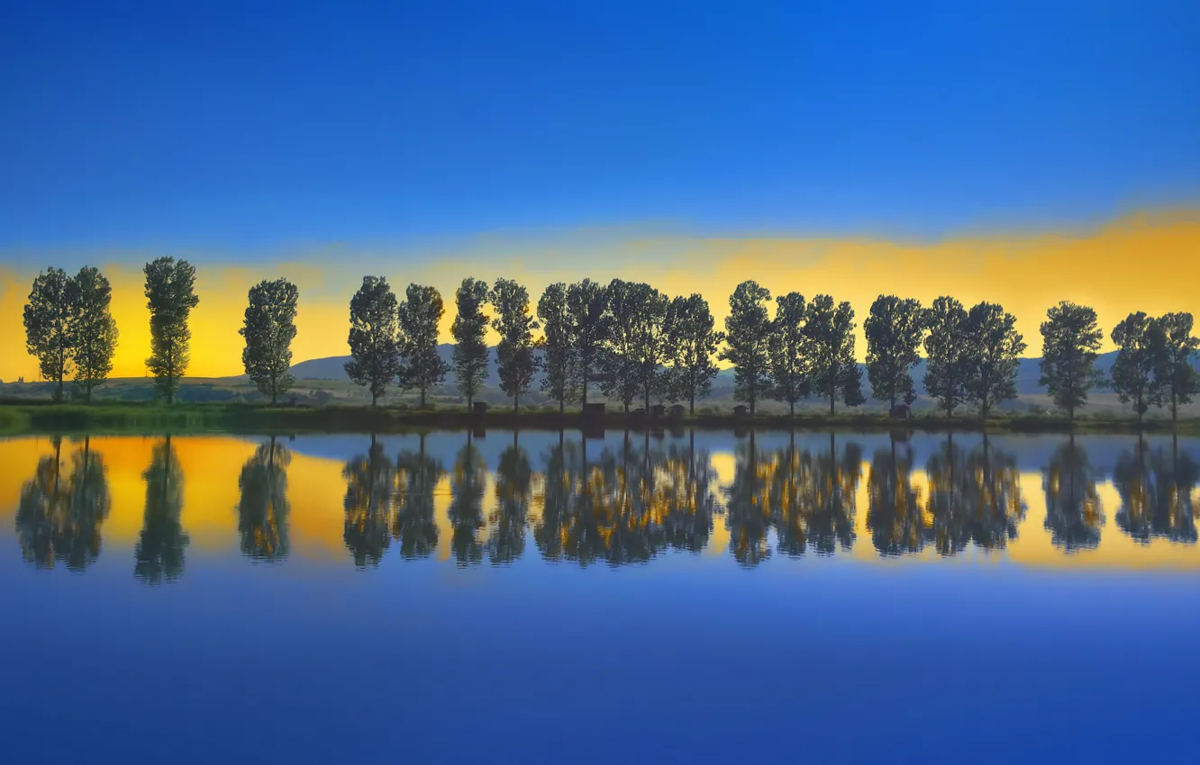 Photo wallpaper clouds, trees, lake, glow