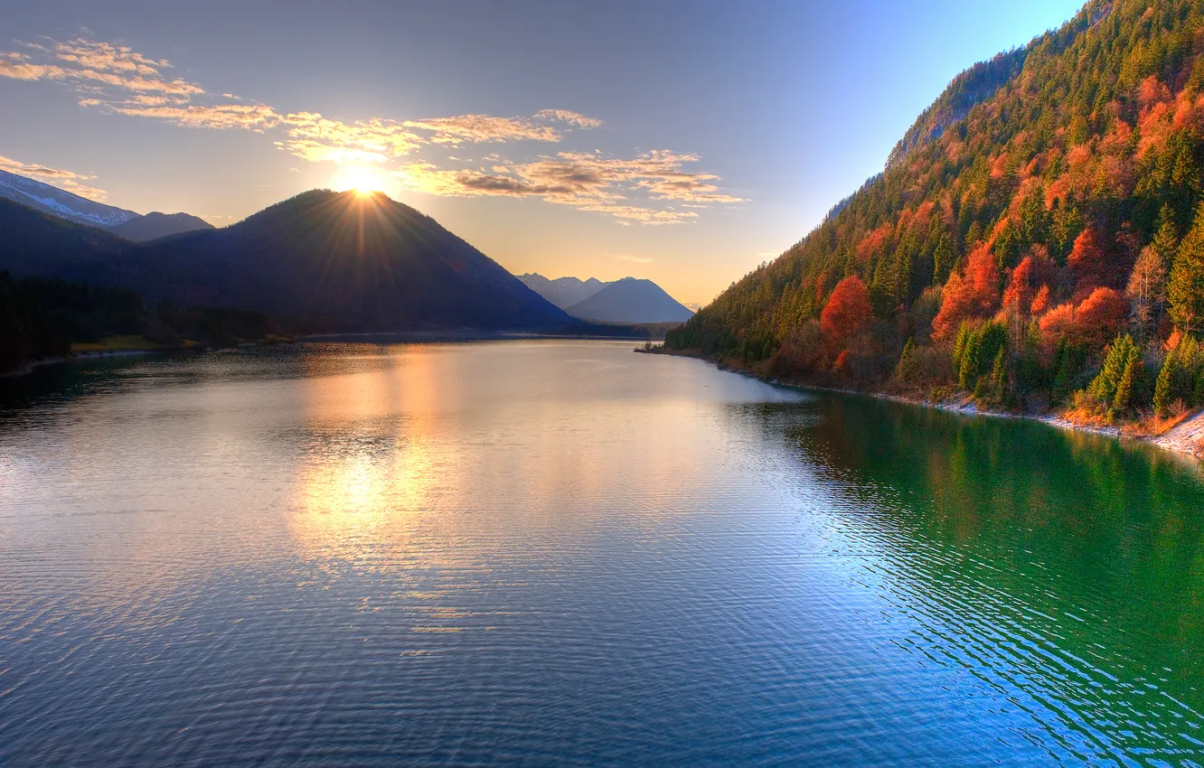 Photo wallpaper autumn, forest, the sun, rays, mountains, surface, river