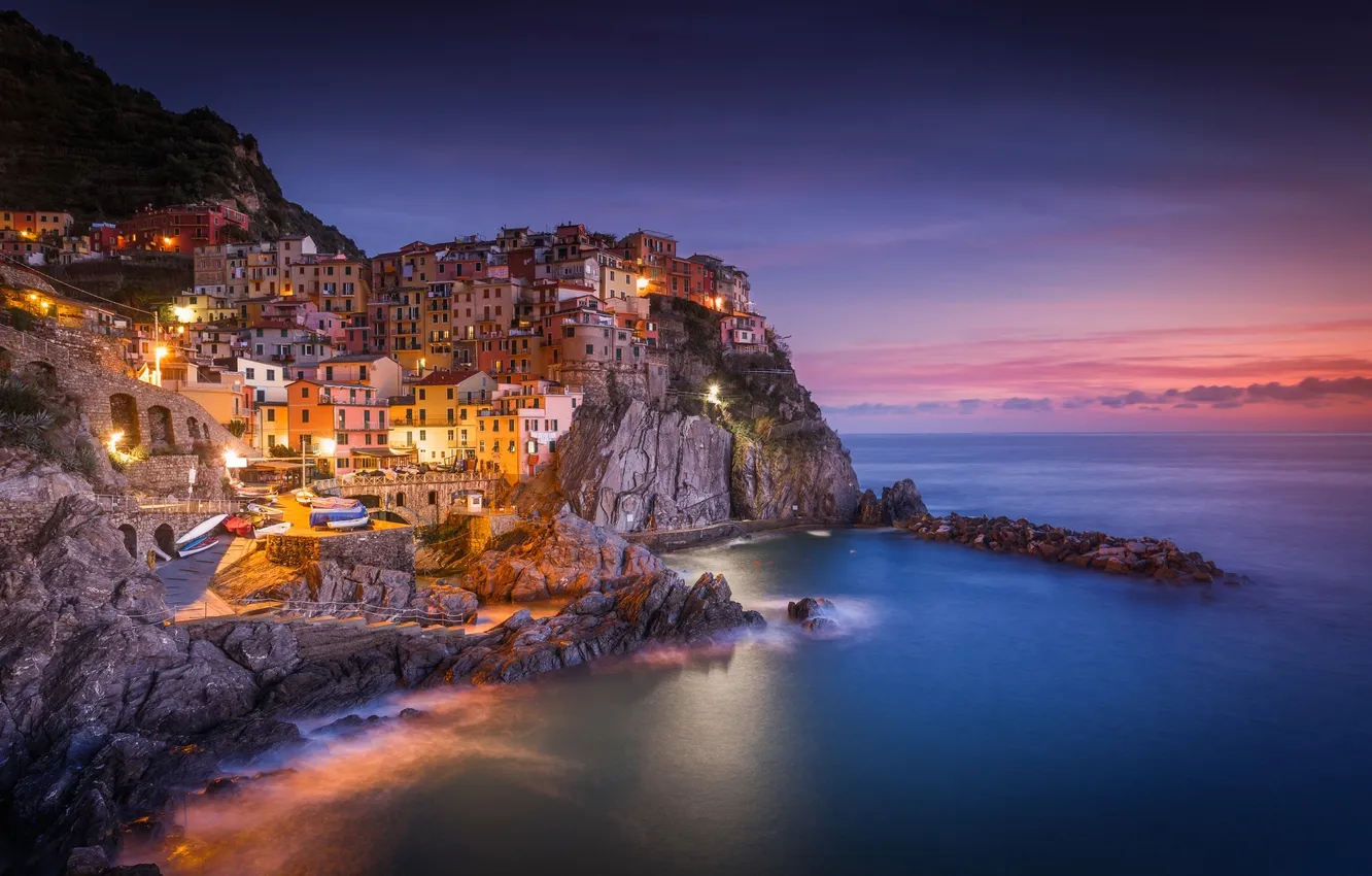 Photo wallpaper sea, sunset, the city, lights, rocks, home, the evening, excerpt