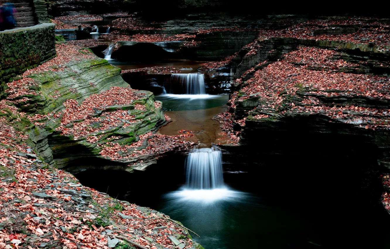 Photo wallpaper autumn, stones, rocks, foliage, waterfall, falling leaves