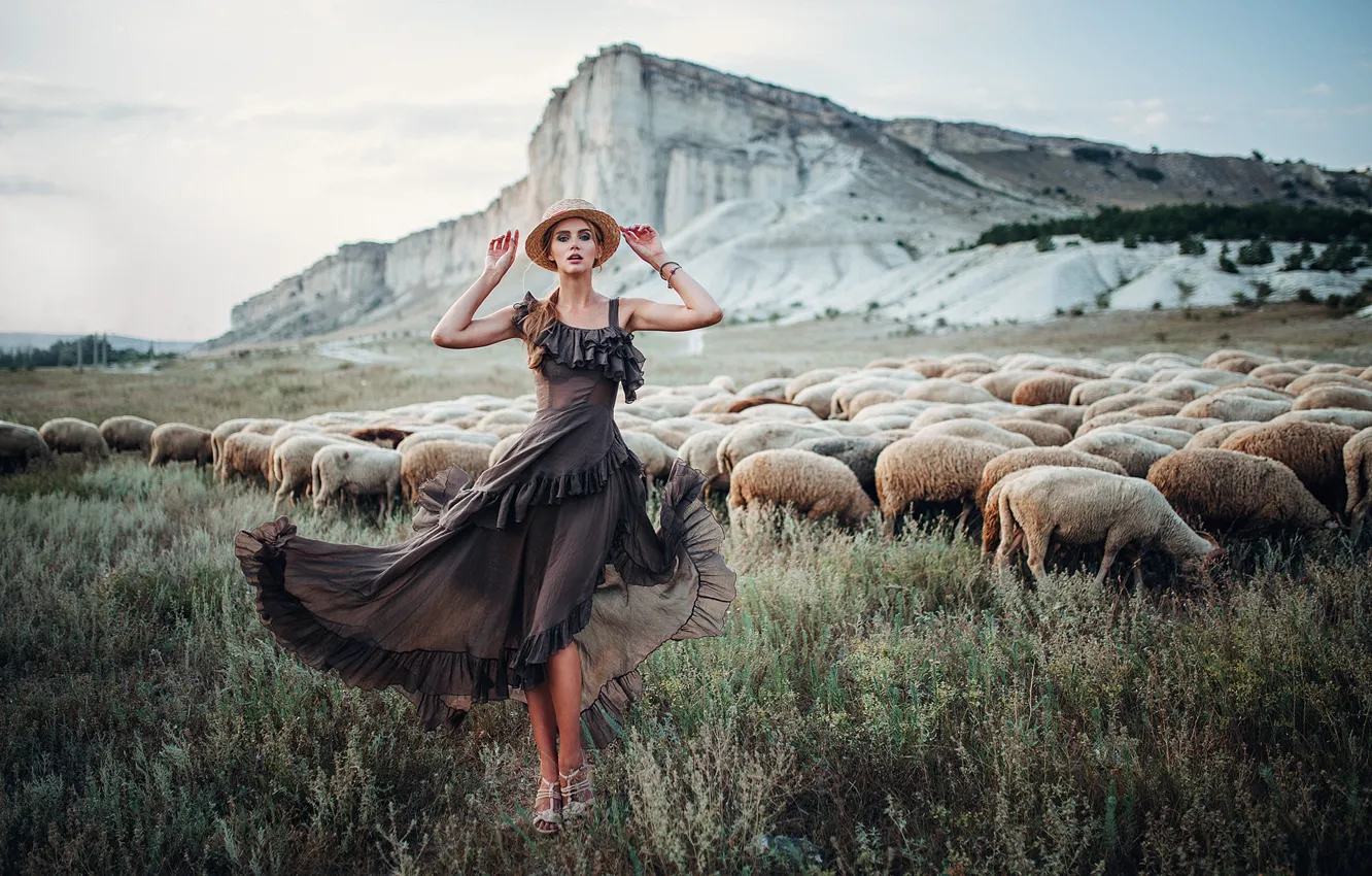 Photo wallpaper girl, pose, rocks, sheep, dress, pasture, hat, Eugene Freyer