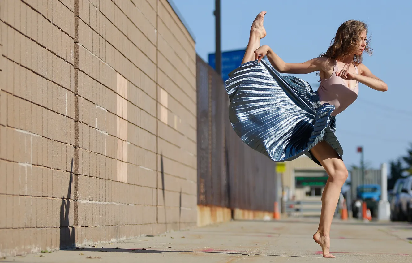 Photo wallpaper girl, face, jump, street, skirt, legs, Sidney