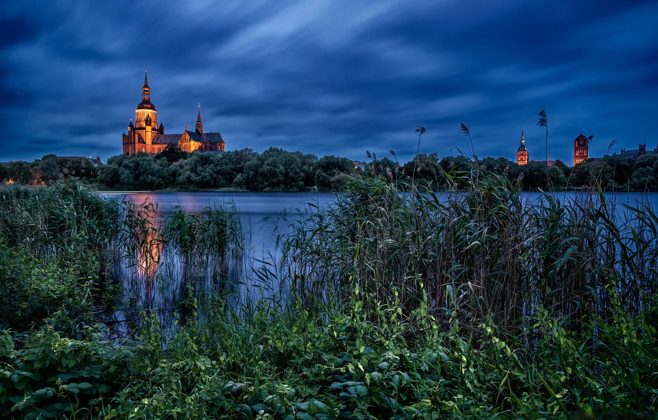 Photo wallpaper lake, the evening, Germany, reed, Church, Germany, St. Mary's Church, Stralsund