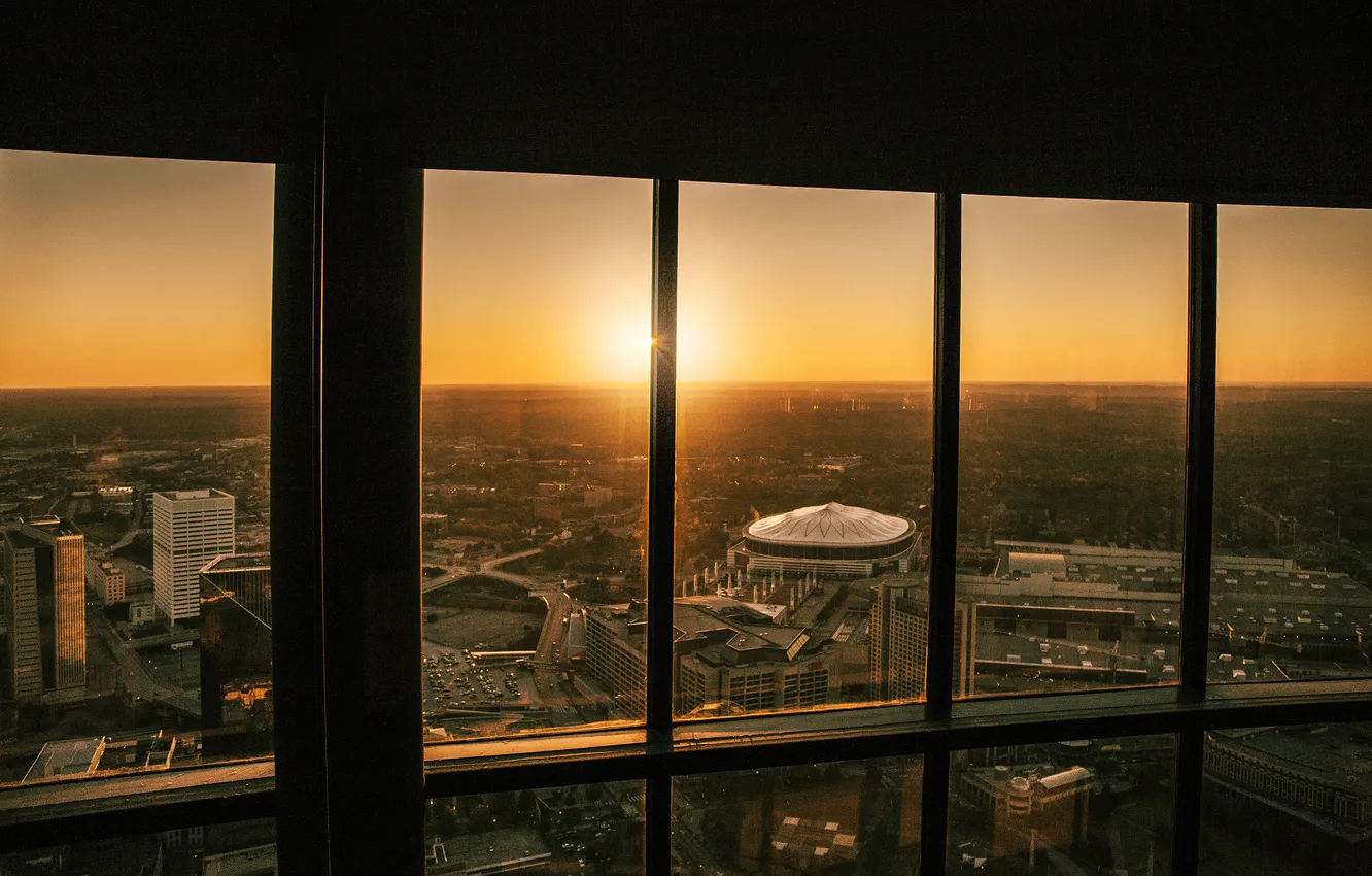 Photo wallpaper the sky, the sun, sunset, the city, building, horizon, glow, the view from the window