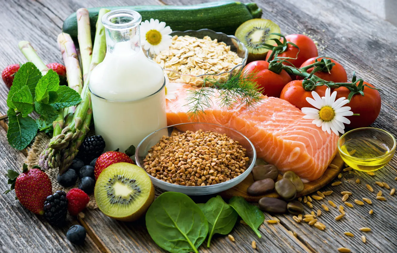 Photo wallpaper greens, leaves, flowers, berries, table, bottle, oil, chamomile