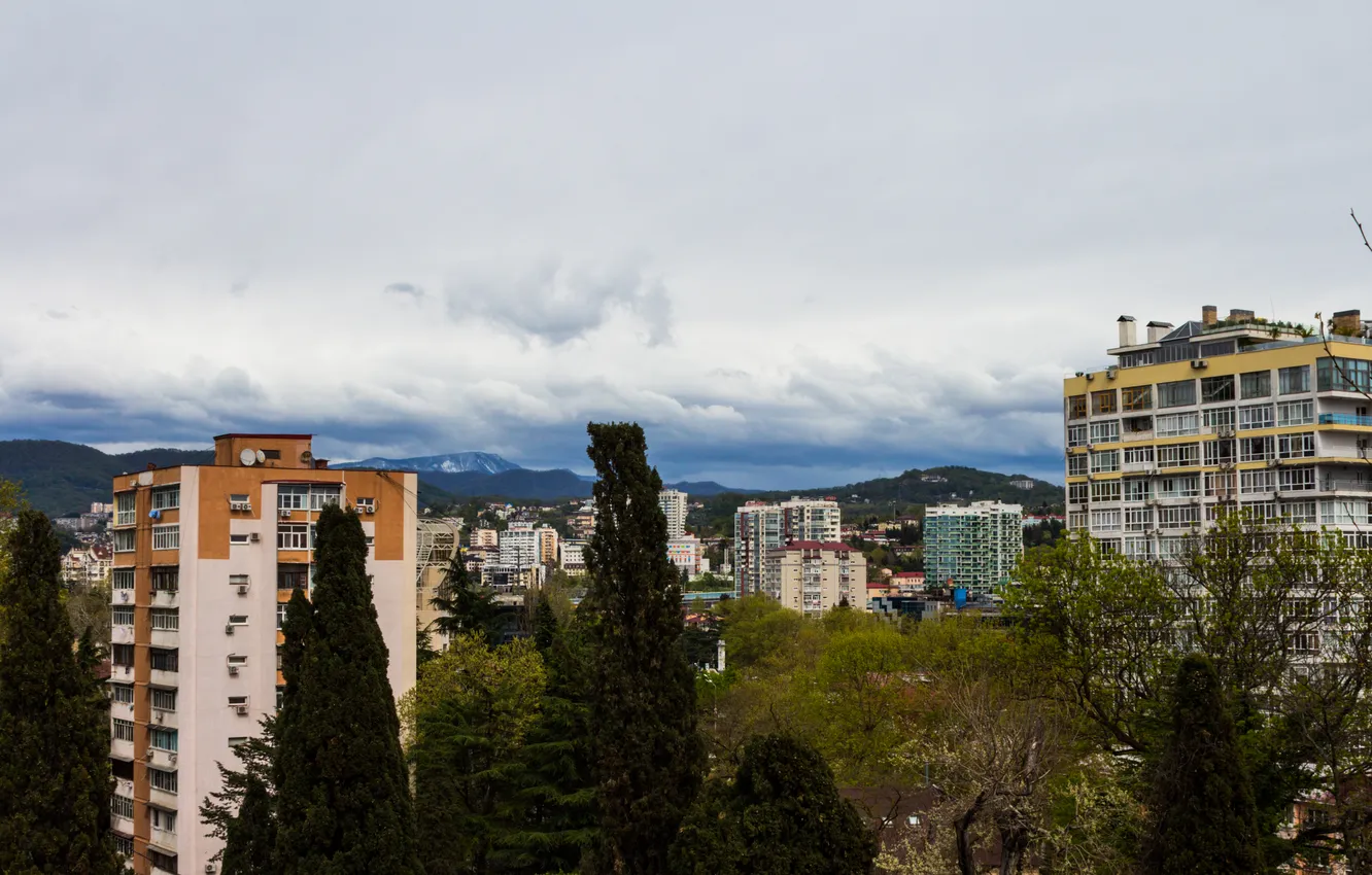Photo wallpaper the sky, trees, mountains, clouds, the city, overcast, building, home
