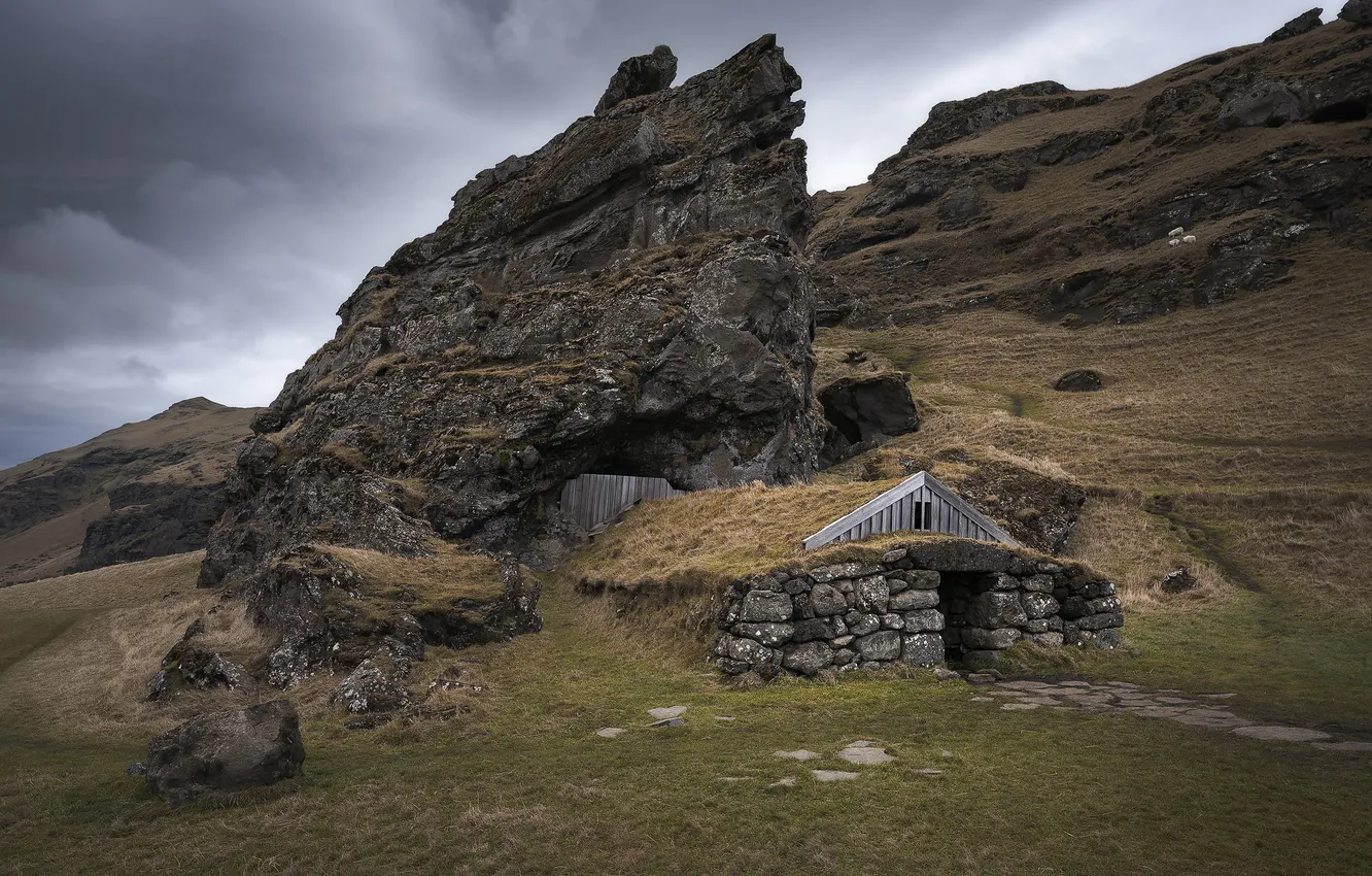 Photo wallpaper field, mountains, clouds, stones, rocks, slope, house, masonry