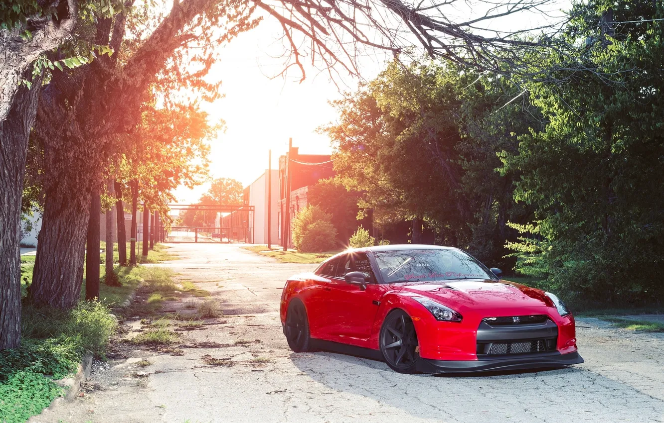 Photo wallpaper the sky, trees, branches, red, posts, GTR, red, Nissan